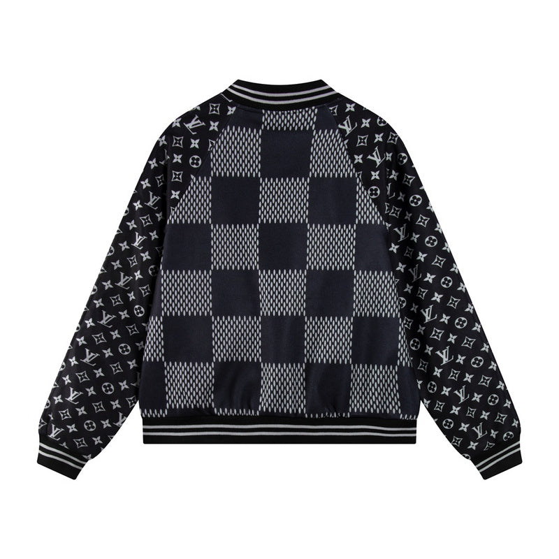 Close-up detail shot of Louis Vuitton luxury clothing with signature branding
