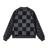 Close-up detail shot of Louis Vuitton luxury clothing with signature branding