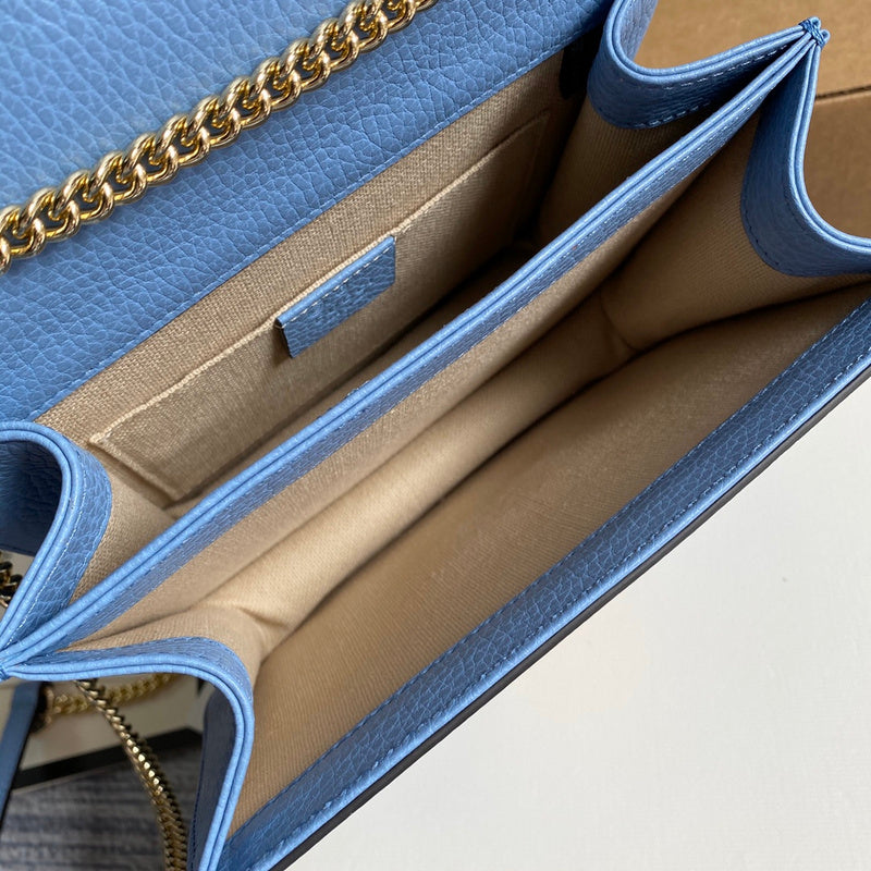 Side profile of sleek structured women's handbag – women's statement bag