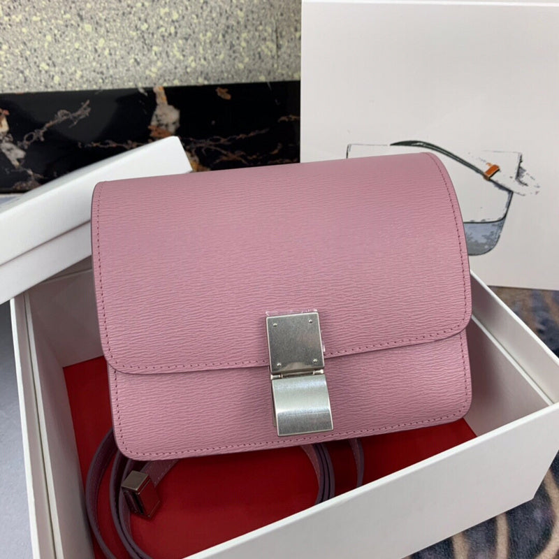 Front view of structured polished women's handbag – women's luxury handbag