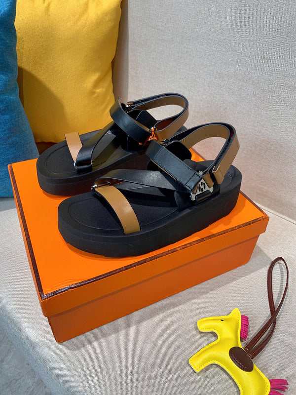 Hermes shoes Style 299 - close-up of statement logo accent