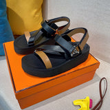 Hermes shoes Style 299 - close-up of statement logo accent
