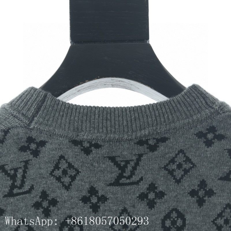 Close-up detail shot of Louis Vuitton luxury clothing with runway-inspired design