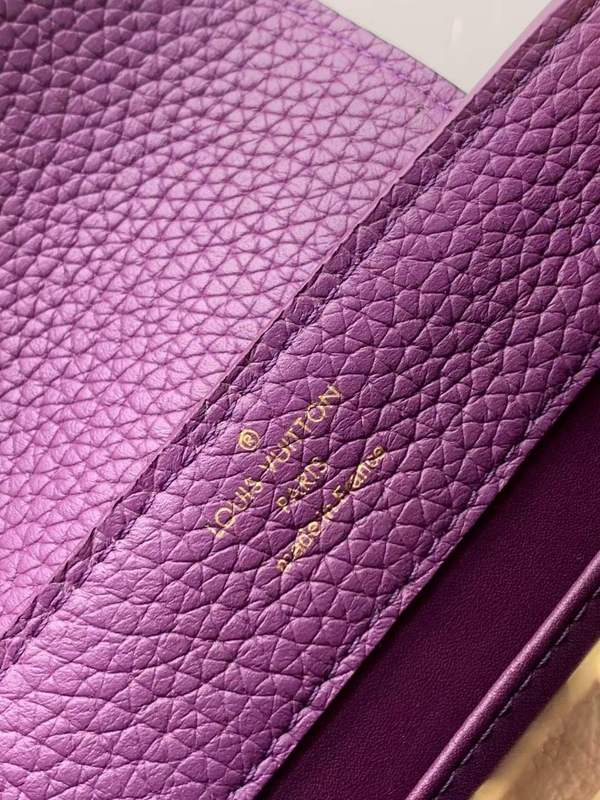 Side profile of statement premium women's handbag – women's premium purse