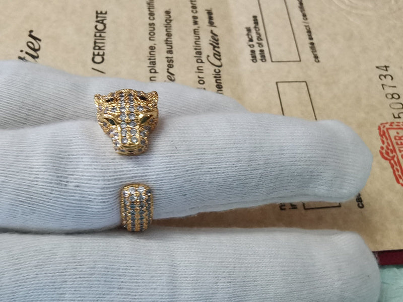 Side view of Cartier unisex jewelry piece