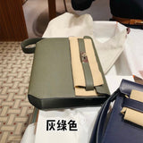 Minimalist crossbody bag carried on shoulder