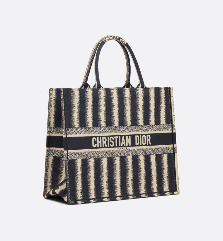Styled lifestyle shot of modern statement women's handbag – women's luxury accessory