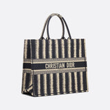 Styled lifestyle shot of modern statement women's handbag – women's luxury accessory