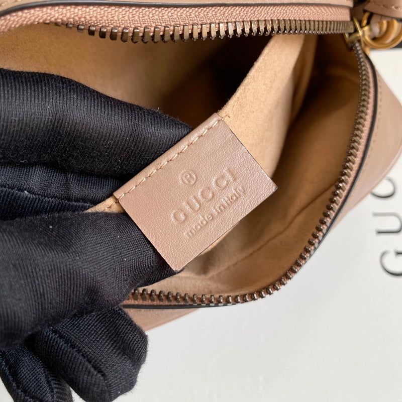 Side profile of everyday-luxe sleek women's handbag – women's luxury accessory