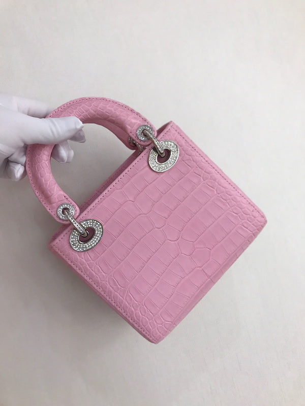 Front view of signature sleek women's handbag – women's designer-style accessory