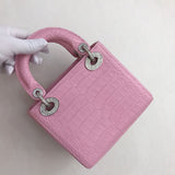 Front view of signature sleek women's handbag – women's designer-style accessory