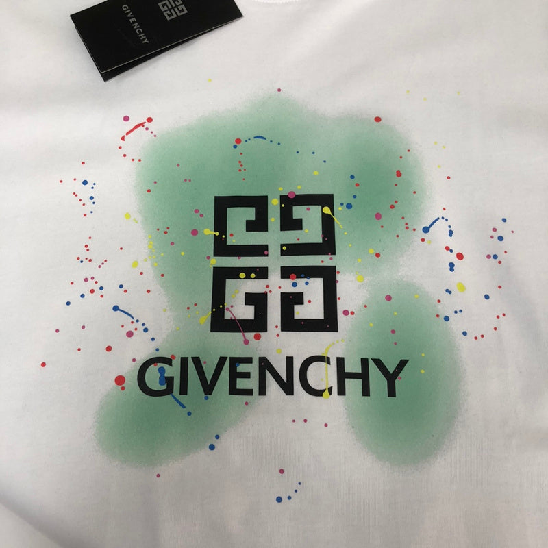 Flat lay presentation of Givenchy luxury clothing with tailored silhouette