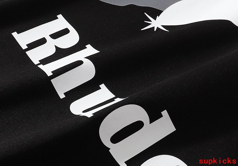 Close-up detail shot of Rhude luxury clothing with contemporary cut