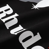 Close-up detail shot of Rhude luxury clothing with contemporary cut