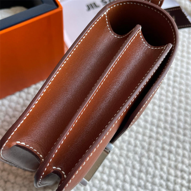 Side view of poised structured handbag