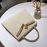  polished satchel detail view showing craftsmanship