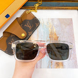 Close-up detail view of Louis Vuitton unisex sunglasses