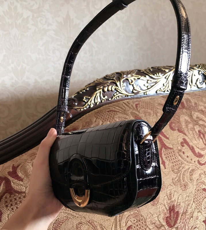 Side view of curated structured handbag