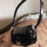 Side view of curated structured handbag