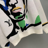 Flat lay presentation of Louis Vuitton luxury clothing with logo-detail design