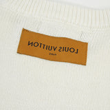 Front view of Louis Vuitton luxury clothing with label-forward styling