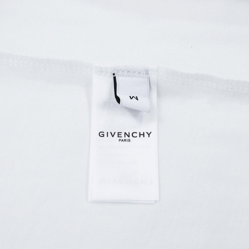 Close-up detail shot of Givenchy luxury clothing with monogram-inspired silhouette