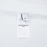 Close-up detail shot of Givenchy luxury clothing with monogram-inspired silhouette