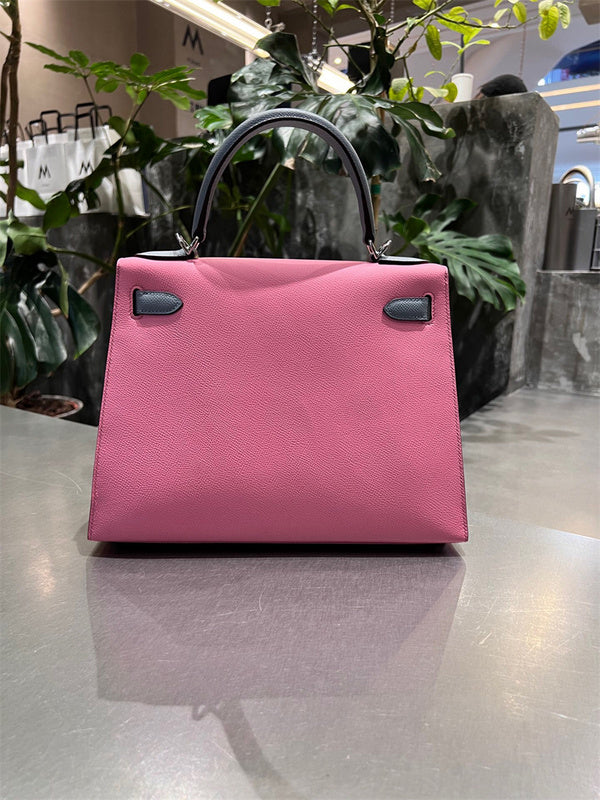 Side view of sophisticated structured handbag