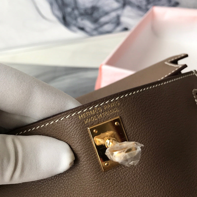 Side view of sleek structured handbag