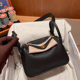 Side view of timeless structured handbag