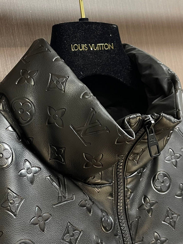 Close-up detail shot of Louis Vuitton luxury clothing with logo-detail design