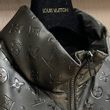 Close-up detail shot of Louis Vuitton luxury clothing with logo-detail design