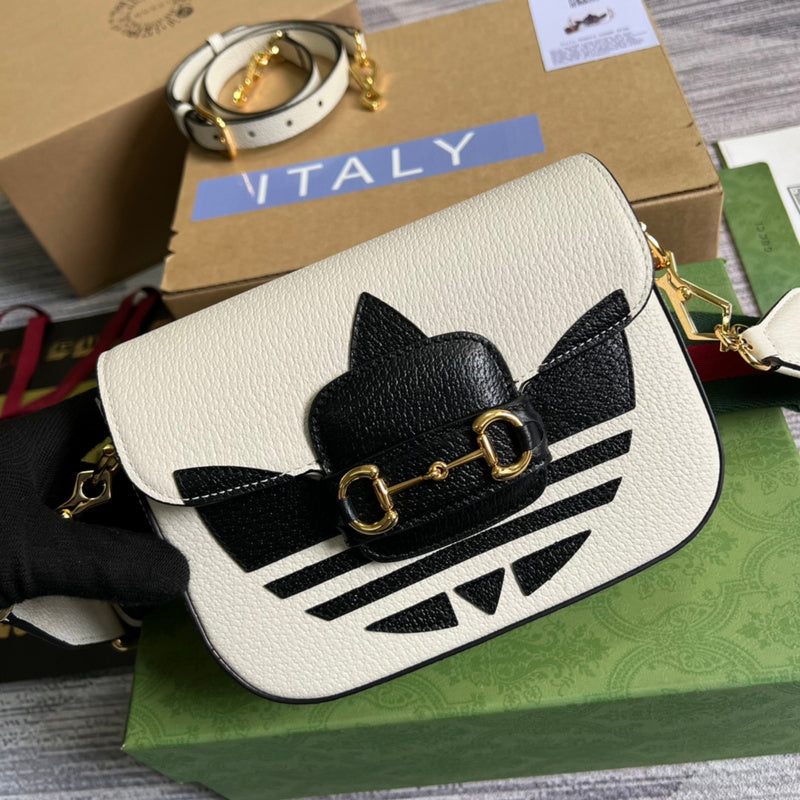 Front view of classic sleek women's handbag – women's designer-style accessory