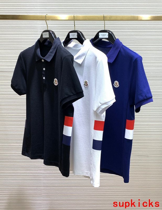 Close-up detail shot of Moncler luxury clothing with signature branding