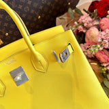 Side view of graceful structured handbag