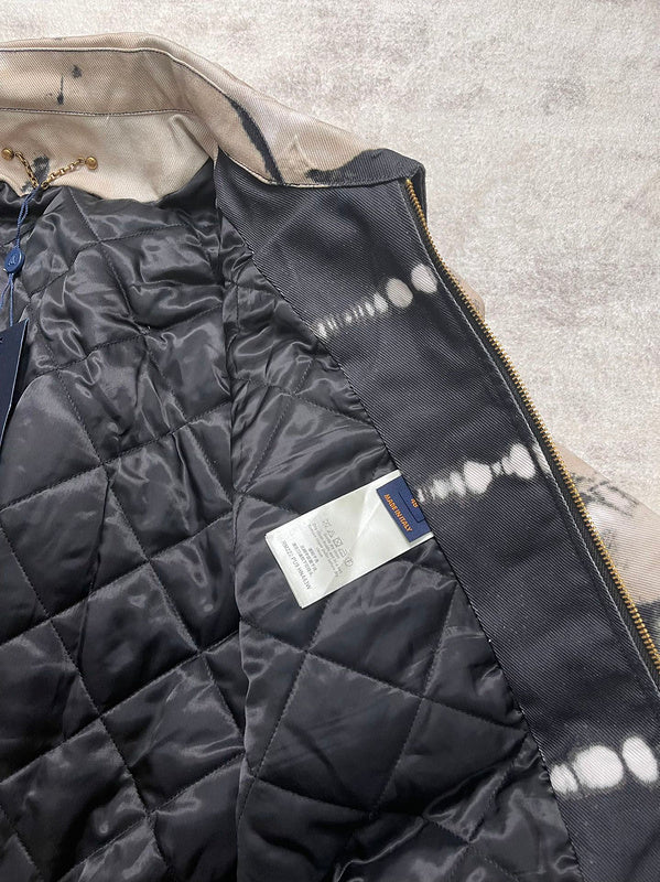 Back view of Louis Vuitton luxury clothing with label-forward styling