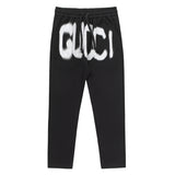Front view of Gucci luxury clothing with monogram-inspired silhouette