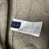 Back view of Louis Vuitton luxury clothing with label-forward styling
