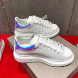 Alexander McQueen Luxury sneakers in tonal black bold athletic profile front view