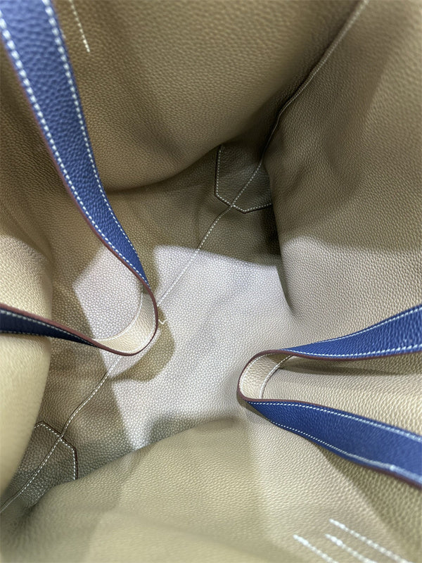 Side view of considered structured handbag