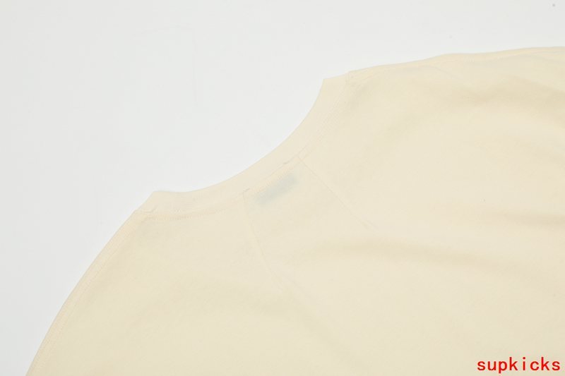 Back view of Rhude luxury clothing with monogram-inspired silhouette