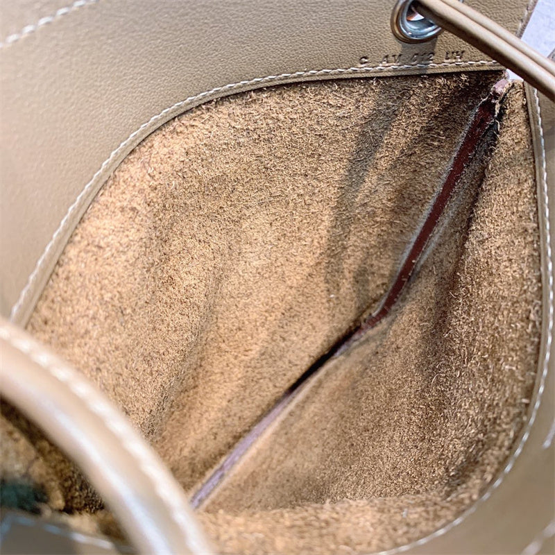 Side view of classic structured handbag