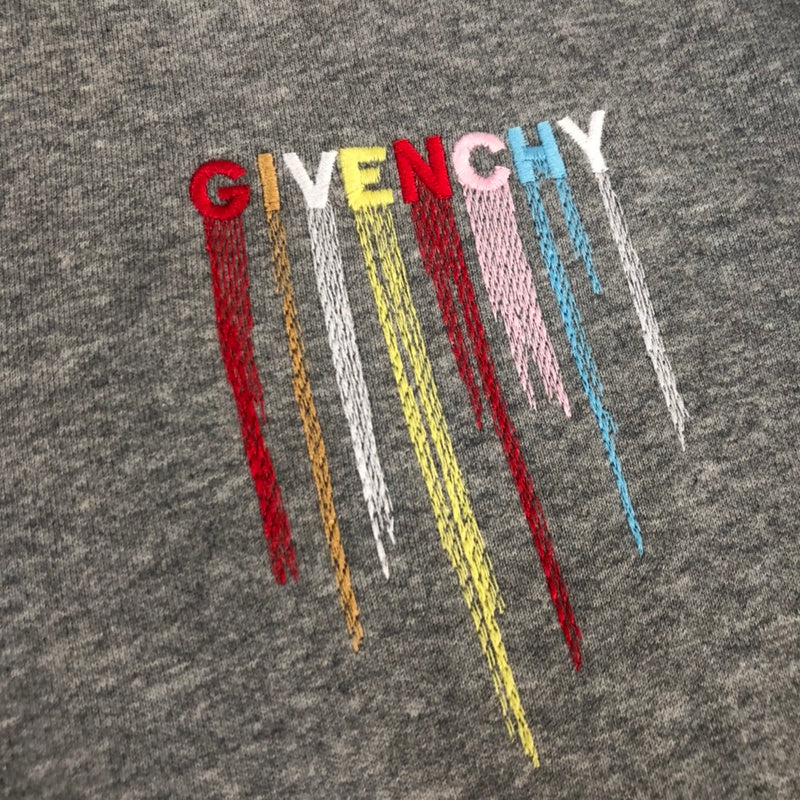 Flat lay presentation of Givenchy luxury clothing with contemporary cut