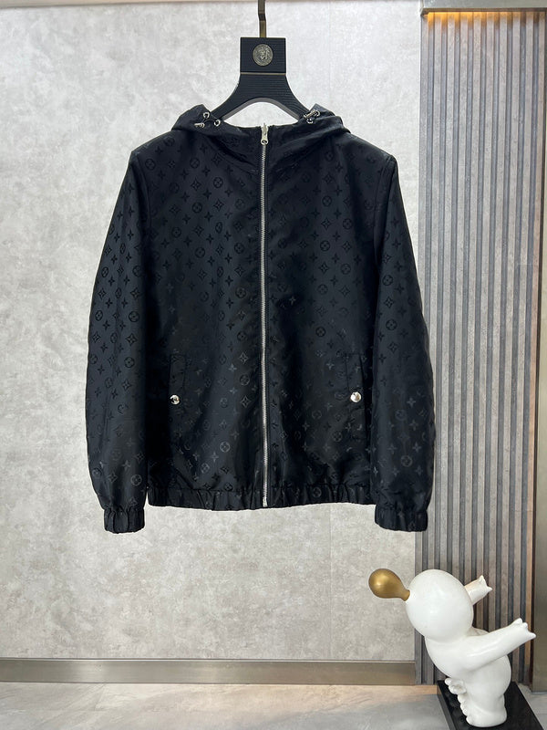 Close-up detail shot of Louis Vuitton luxury clothing with label-forward styling