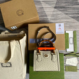 Front view of classic signature women's handbag – women's luxury handbag