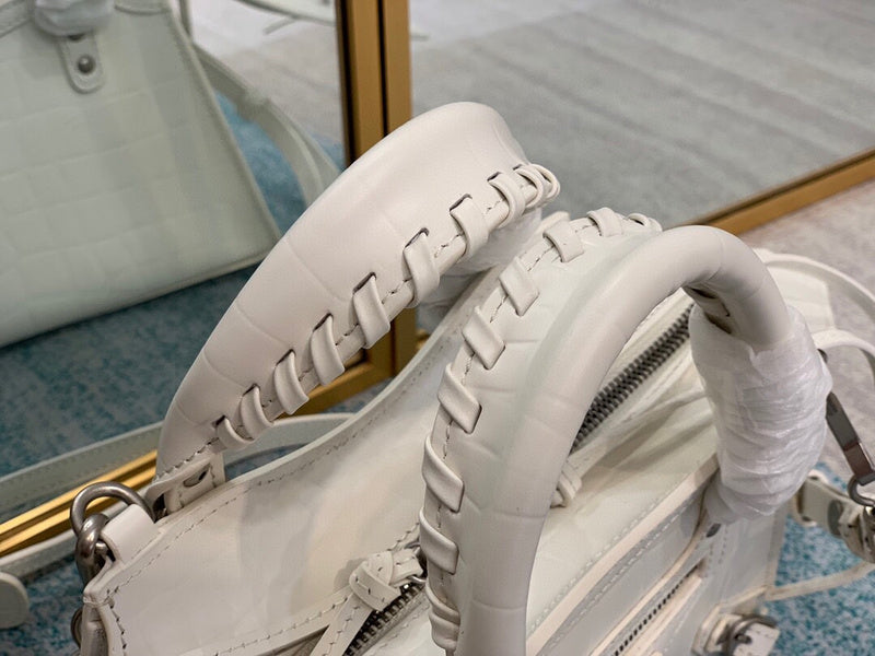 Understated Premium PU Leather Handbag - Statement Silhouette | Women's Premium Handbag #665 - styled full view (image 7) of designer-inspired handbag