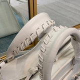 Understated Premium PU Leather Handbag - Statement Silhouette | Women's Premium Handbag #665 - styled full view (image 7) of designer-inspired handbag