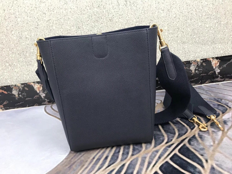 Styled lifestyle shot of modern structured women's handbag – women's luxury handbag