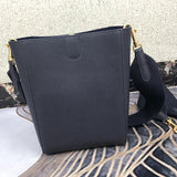 Styled lifestyle shot of modern structured women's handbag – women's luxury handbag