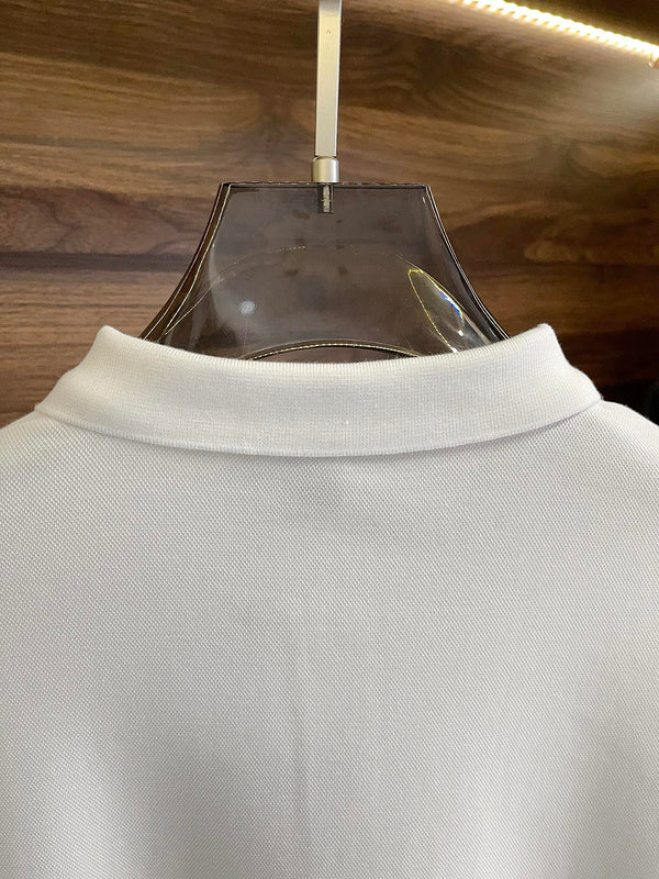 Front view of Louis Vuitton luxury clothing with label-forward styling